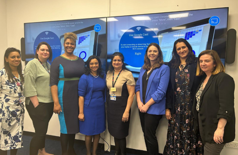 Dr Reva Gudi and Laura Blumenthal with hospital staff at the meeting